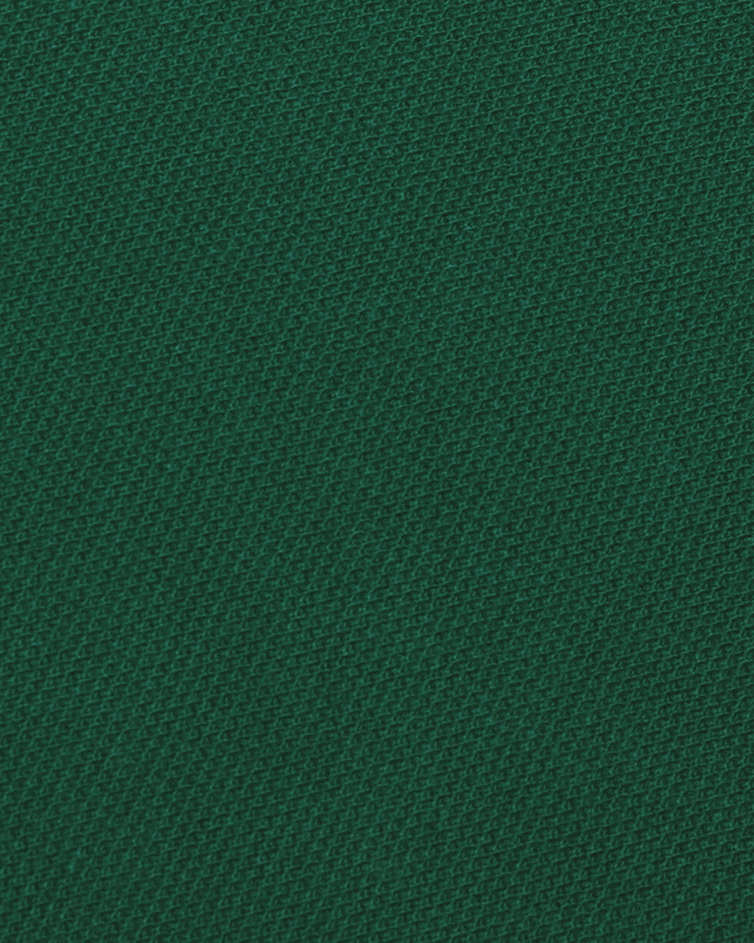 Close up of the custom oxford polo shirt for men by Luxire in racing green