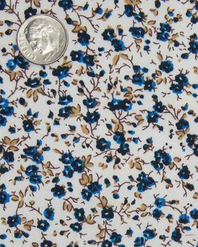 Col cubain PRÉRÉGLÉ en bleu à fines fleurs sur fond blanc