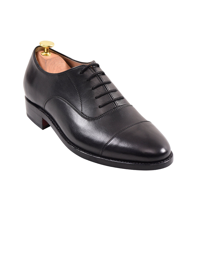 Chaussures Oxford noires à bout rapporté