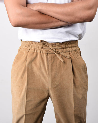 Pantalon en velours côtelé beige clair à cordon de serrage 25 côtes