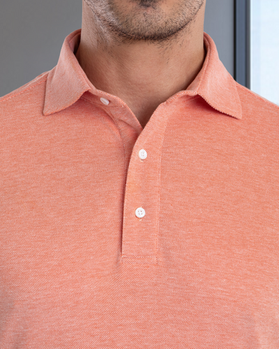 Polo orange et blanc chiné