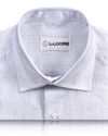 Chemise en lin à fines rayures bleues et blanches